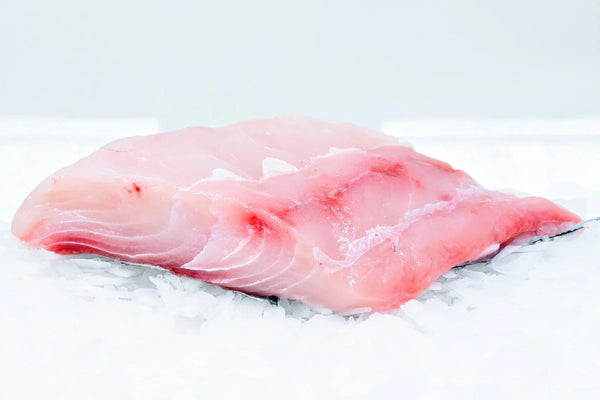 A freshly cut Mahi Mahi Fillet on ice ready for home delivery and prepared by Four Star Seafood's Bay Area Fishmongers
