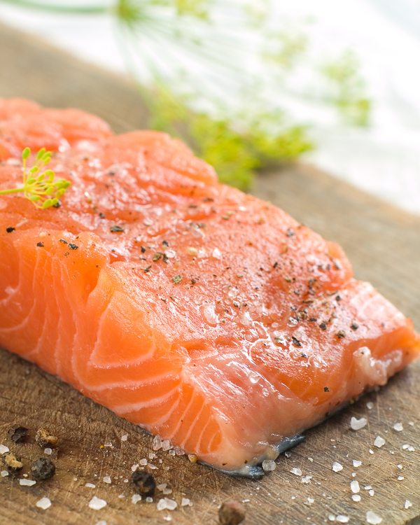 fresh king salmon fillet with seasonings