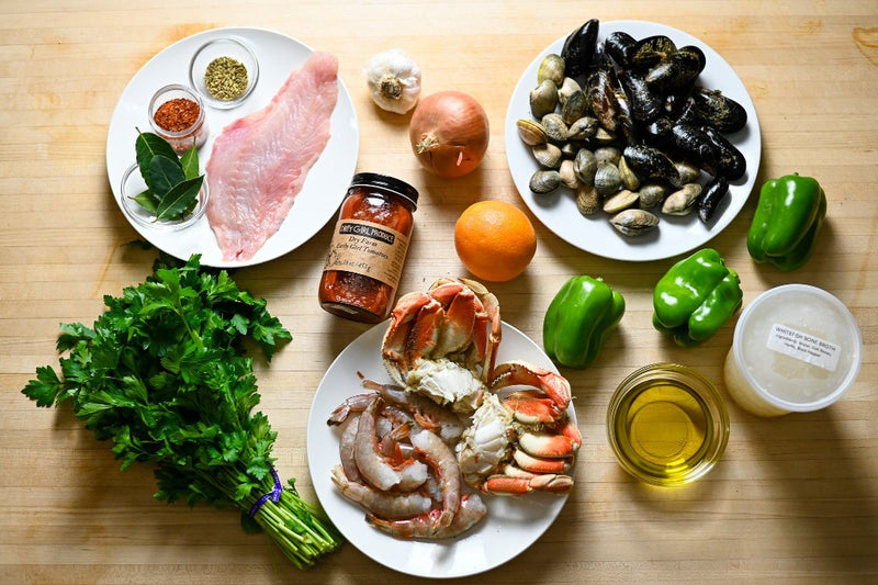 cioppino mise en place on the cutting board