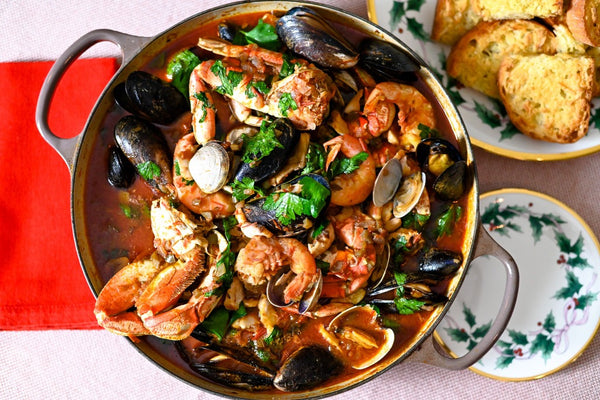 cioppino on the table with garlic bread