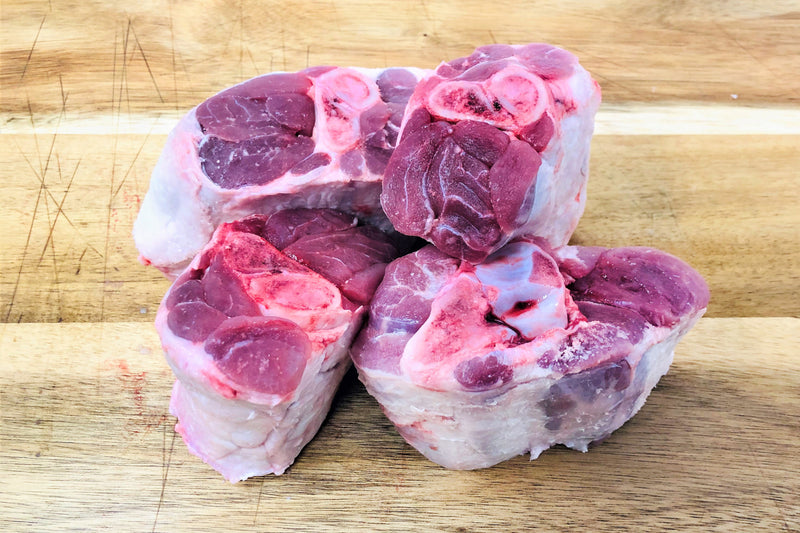 Heritage Pork Osso Buco on a cutting board